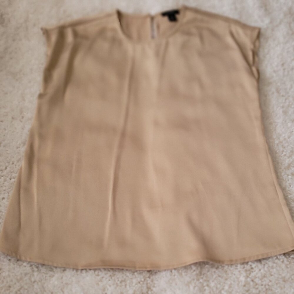 Halogen sleeveless tan shell size XS.